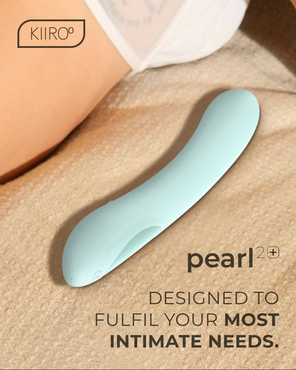 Light blue pearl 2+ pleasure device on beige fabric with Kiiro logo and text.