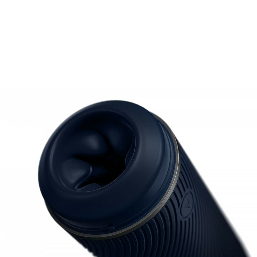 Dark blue masturbator for men on a white background