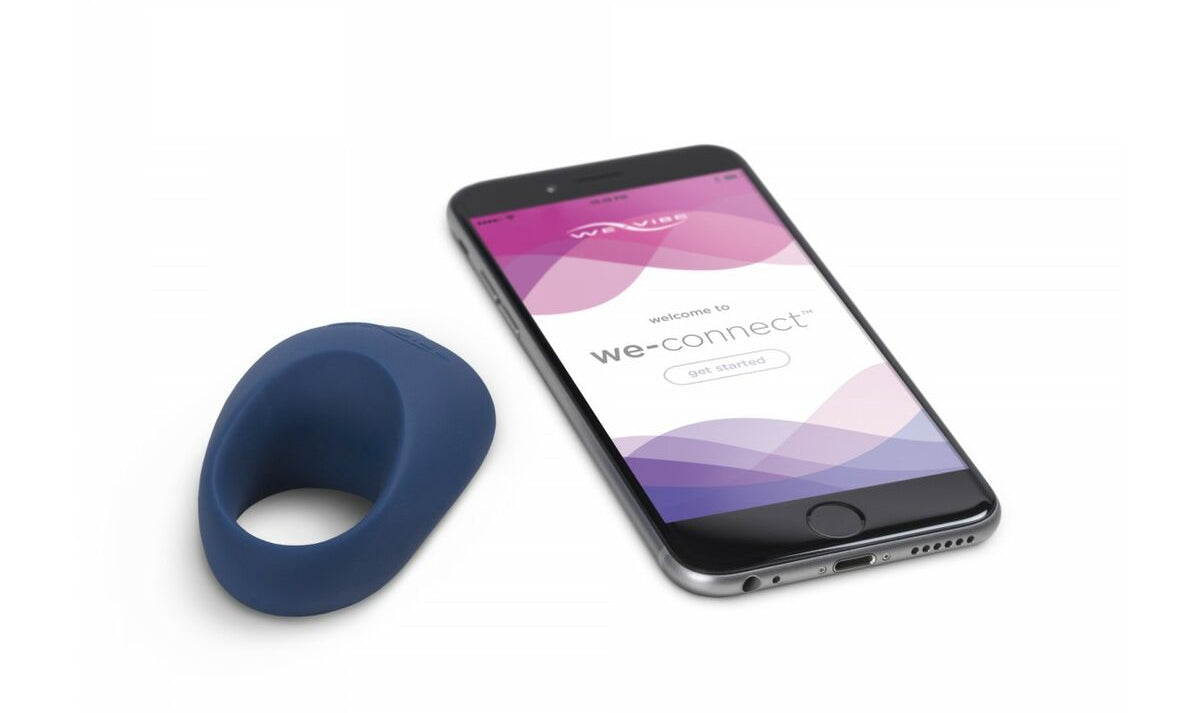 Blue sexual wellness device and smartphone with app interface on a white background