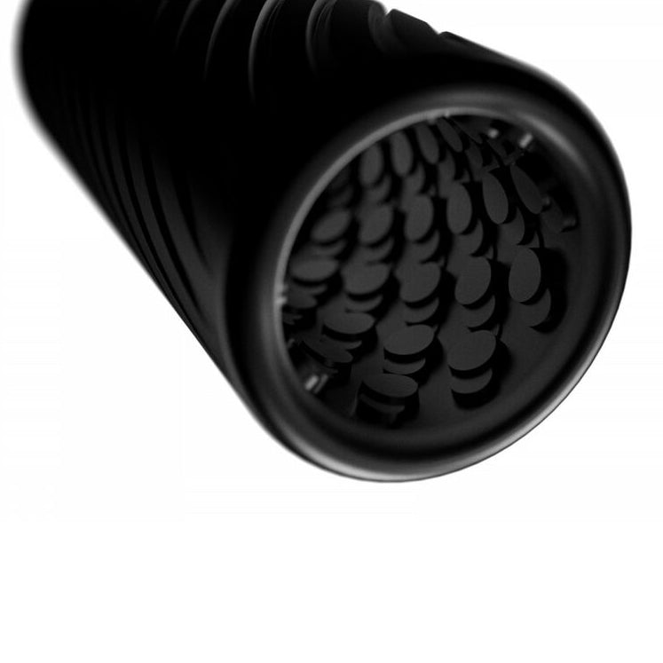 Black silicone pleasure toy for men on a white background