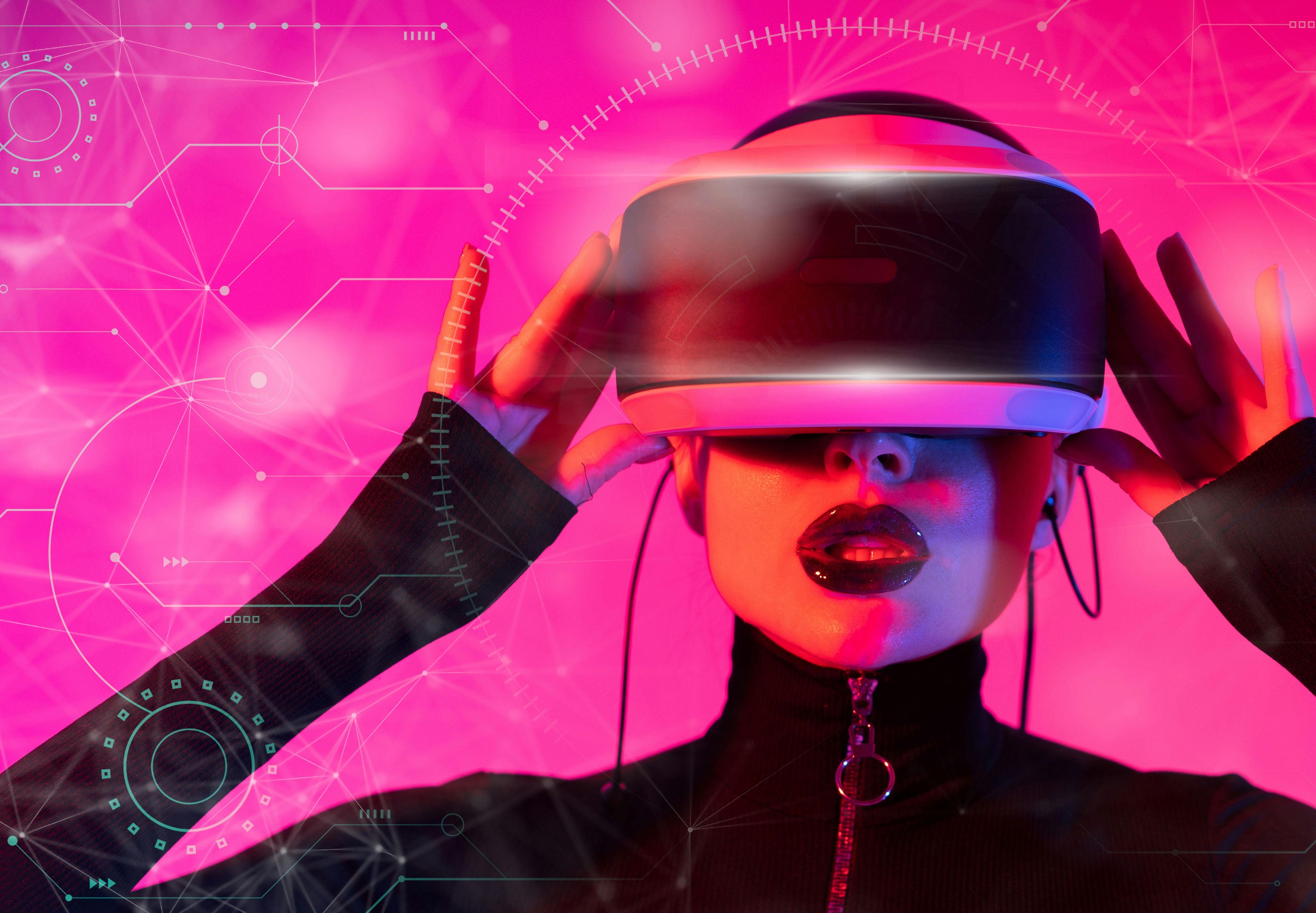 Person wearing a VR headset with a futuristic pink background