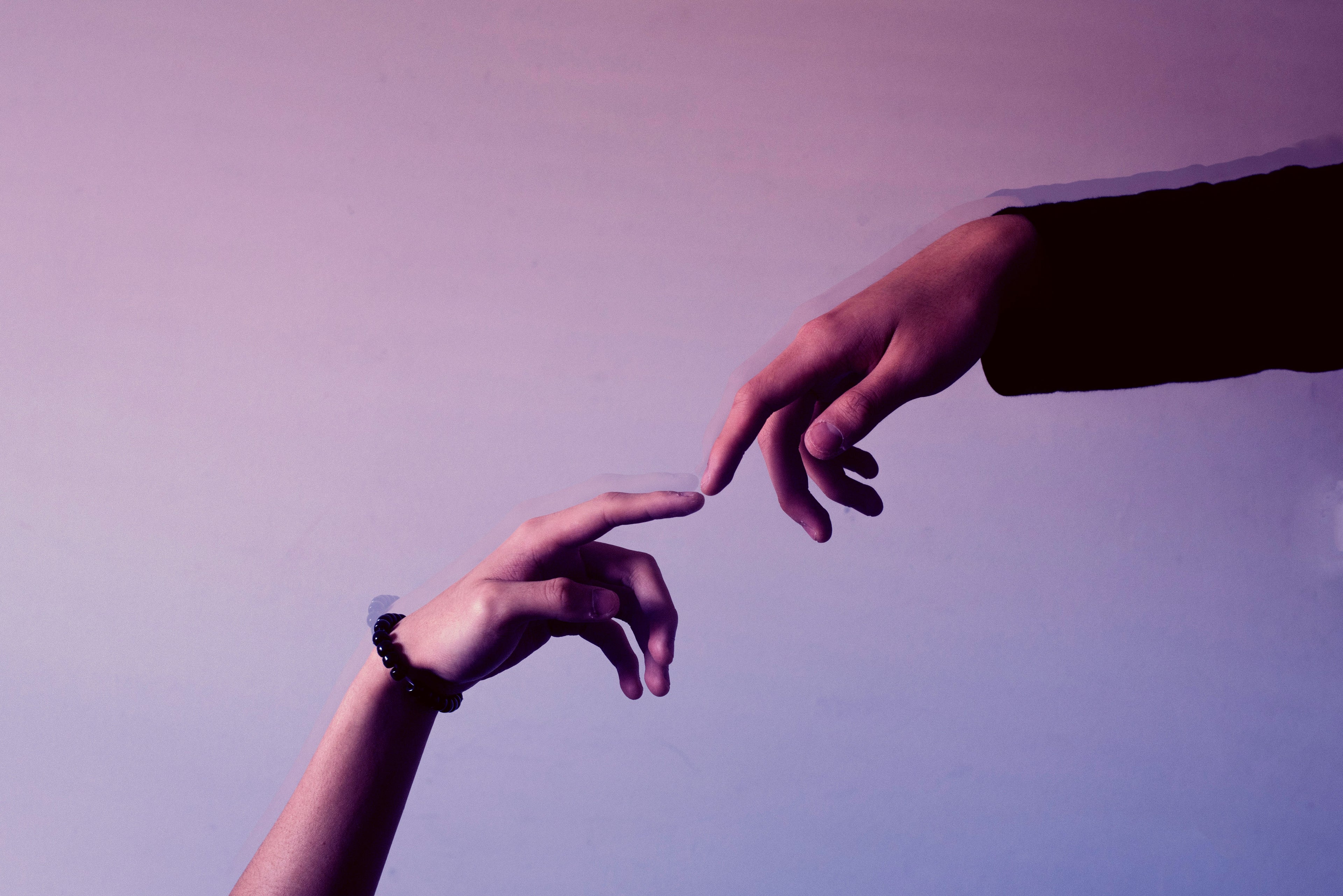 Two affiliate hands reaching towards each other showcasing our Affiliate Program and how to Earn With Our Premium Adult Toys