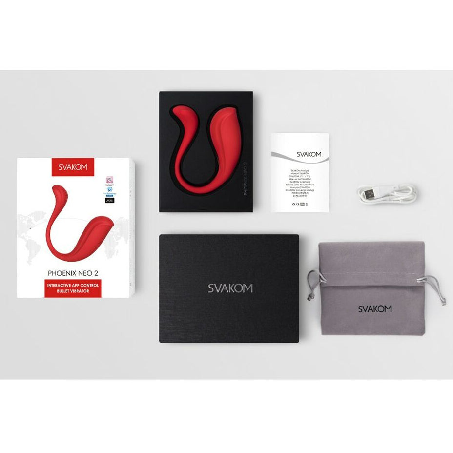 Collection of SVAKOM erotic products including packaging, a black box, and a pouch on a white background.