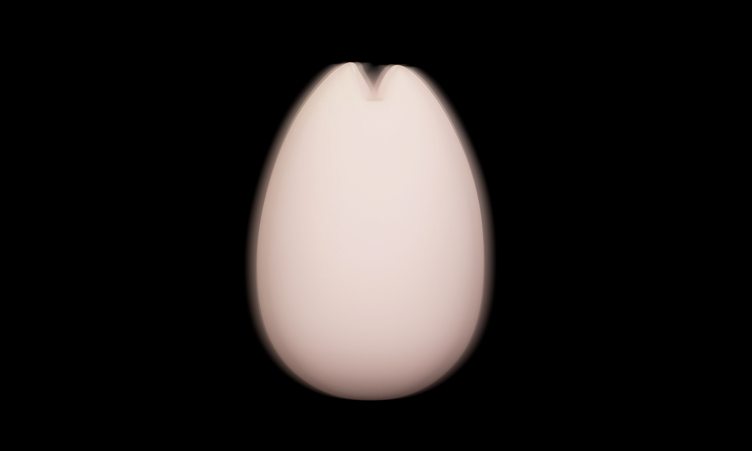 buzzing pink egg shaped object over deep purple background