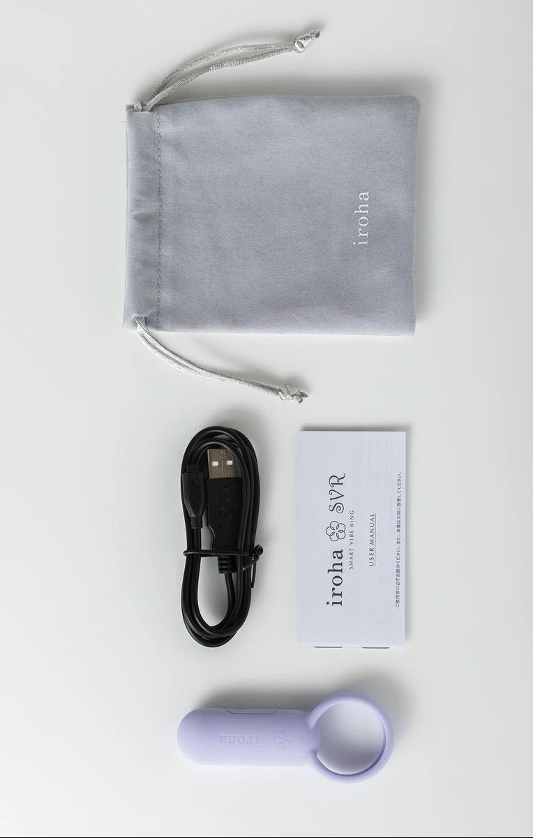 Product packaging with a lavender colour iroha svr vibrating ring for couples, black usb charging cable, and gray drawstring bag on a white background.