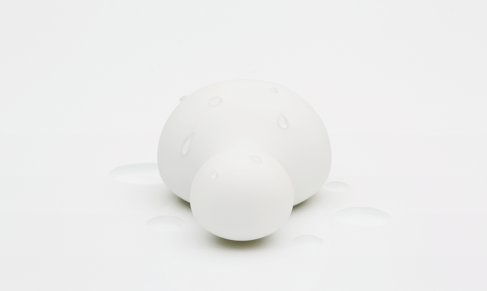 White cylindrical object on a white background