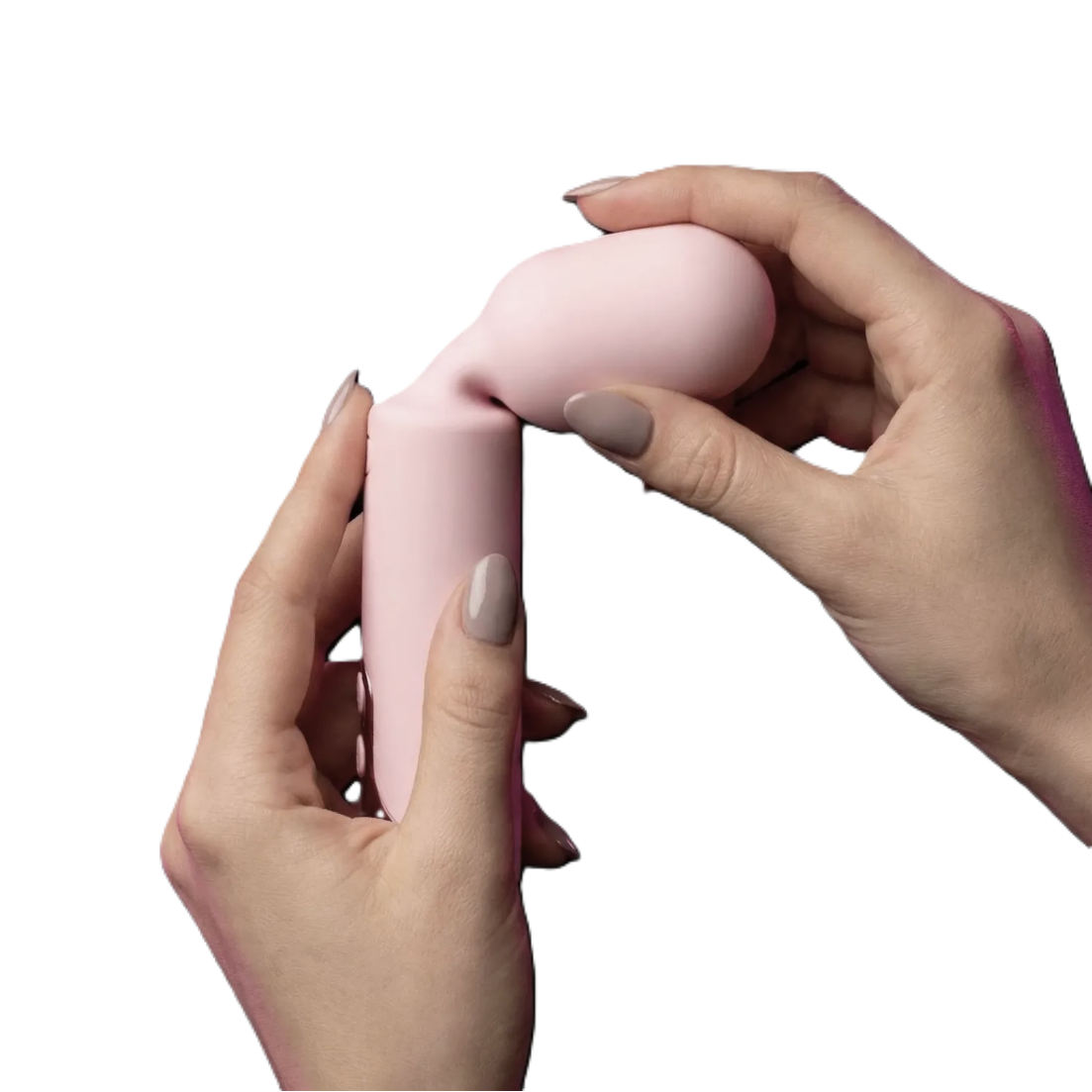 hands holding a pink sexual wellness device over a white background