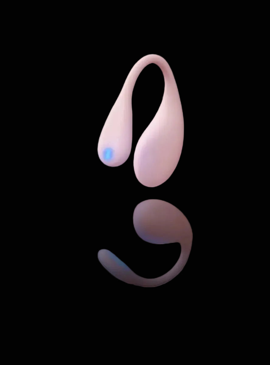 Pink curved g-spot stimulator on a black background