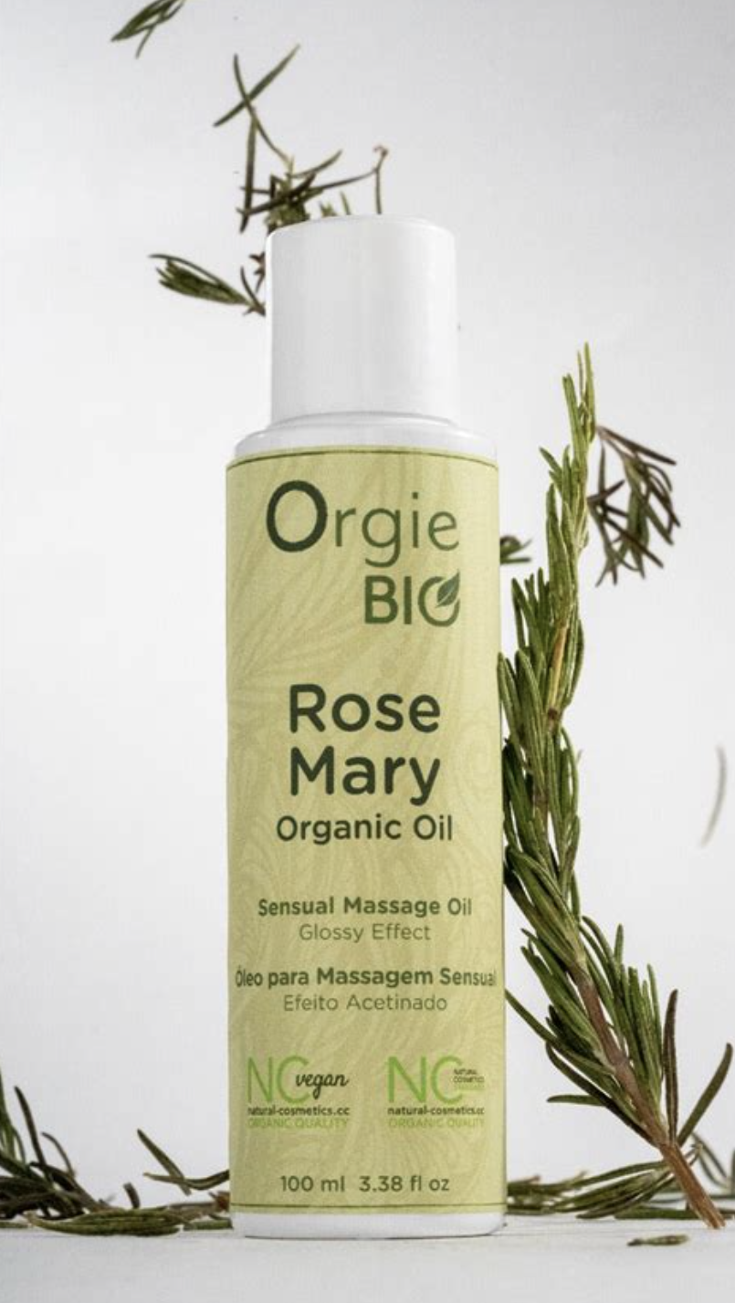 Orgie Bio Rose Mary Organic Oil bottle with rosemary leaves on a white background