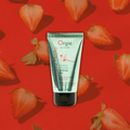 Tube of Orgie Strawberry Mojito flavored intimate gel on a light gray background