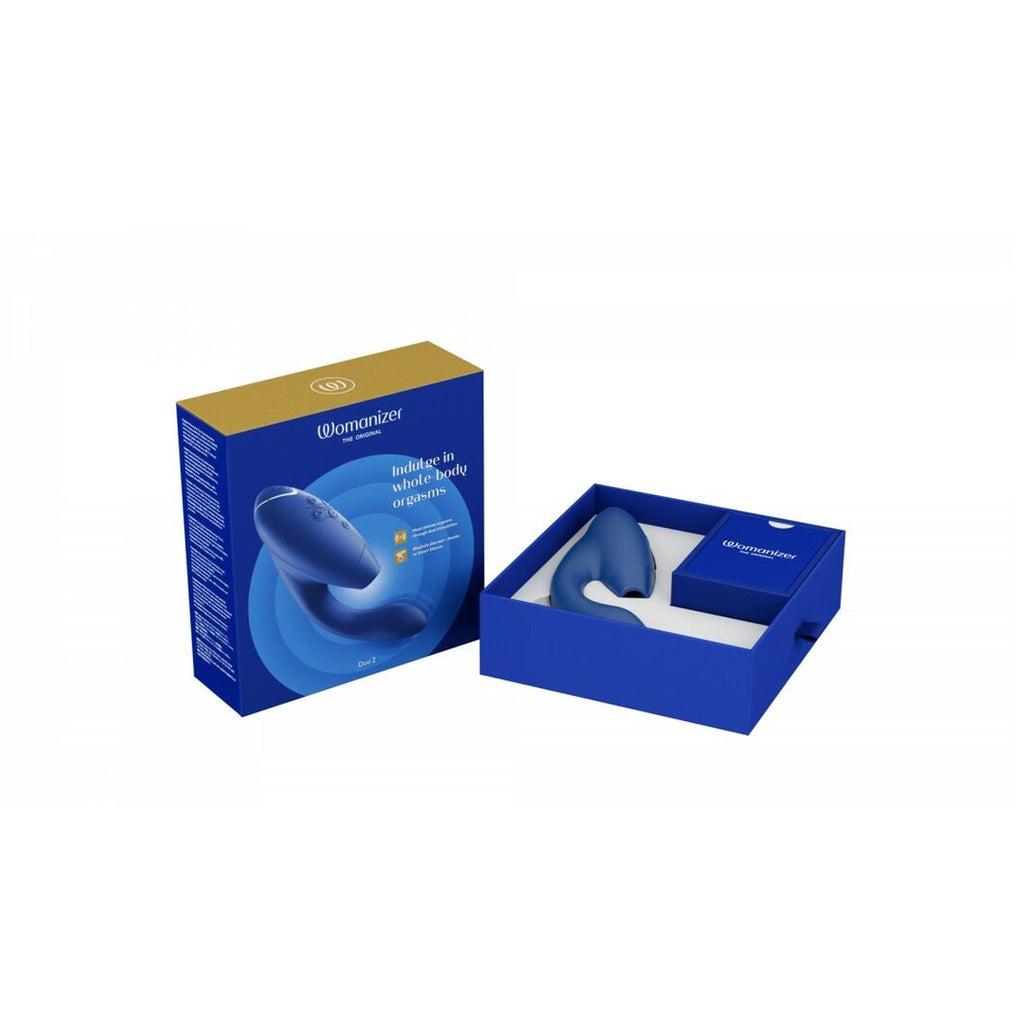 Blue erotic device packaging with 'womanizer' branding and a gold top on a white background