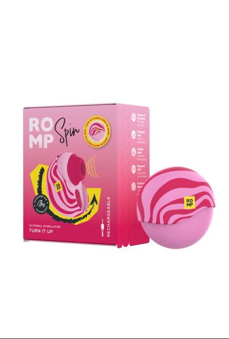 Pink romp spin adult product with packaging on a white background
