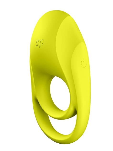 Yellow silicone penis ring on a white background