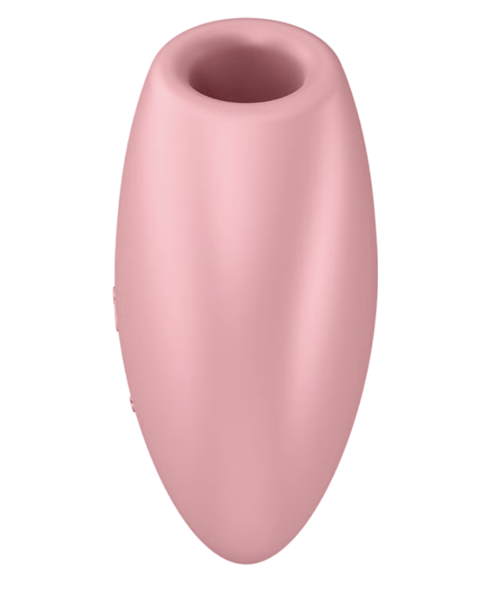 Pink silicone sexual wellness toy on a white background