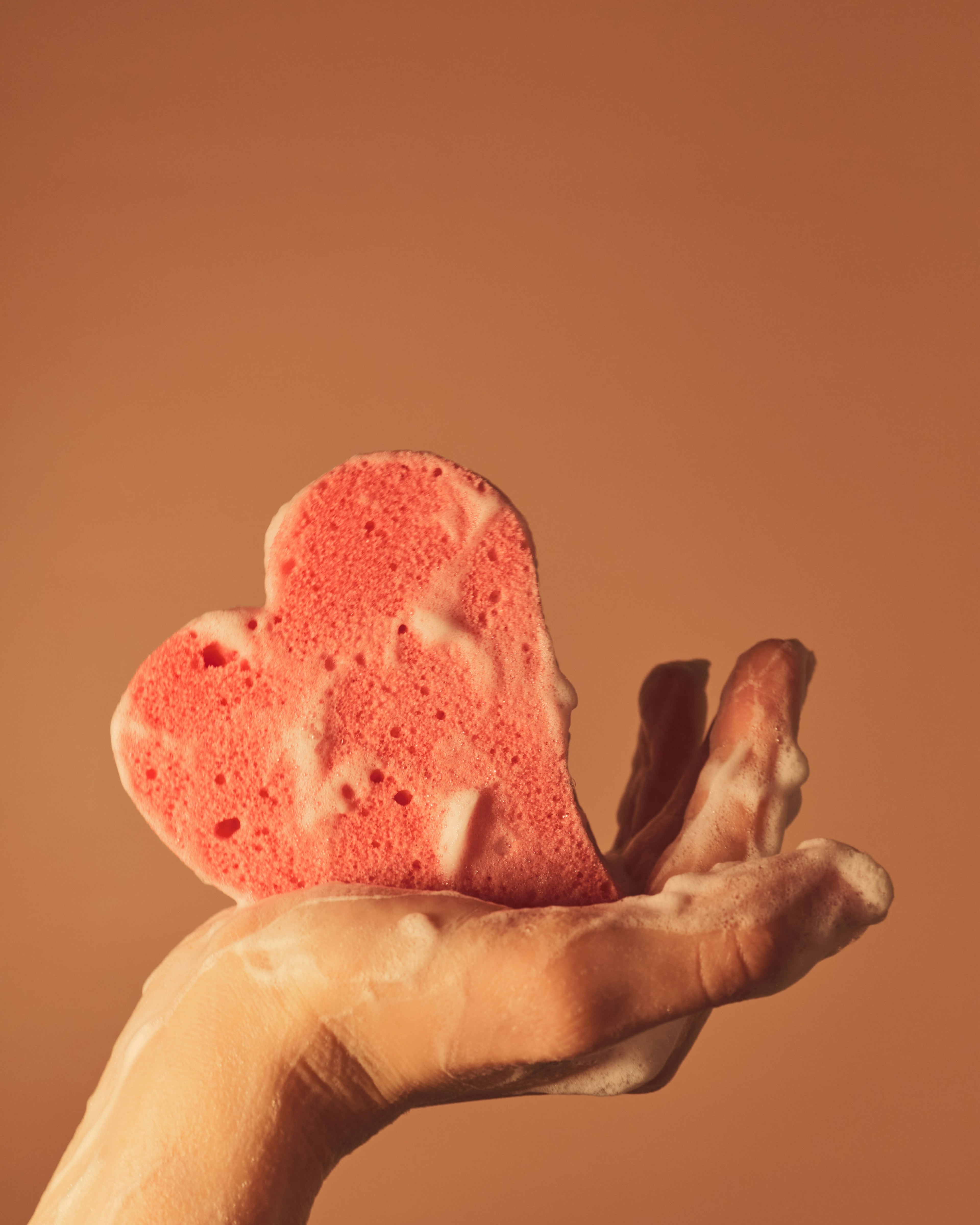 sex toy cleaner heart shaped sponge designed to keep adult toys hygienic, bacteria-free, and safe for intimate use