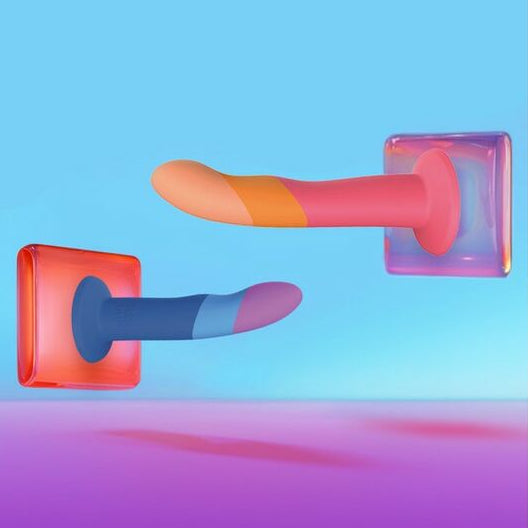 Colorful dildos stuck on the wall  on a blue and purple gradient background