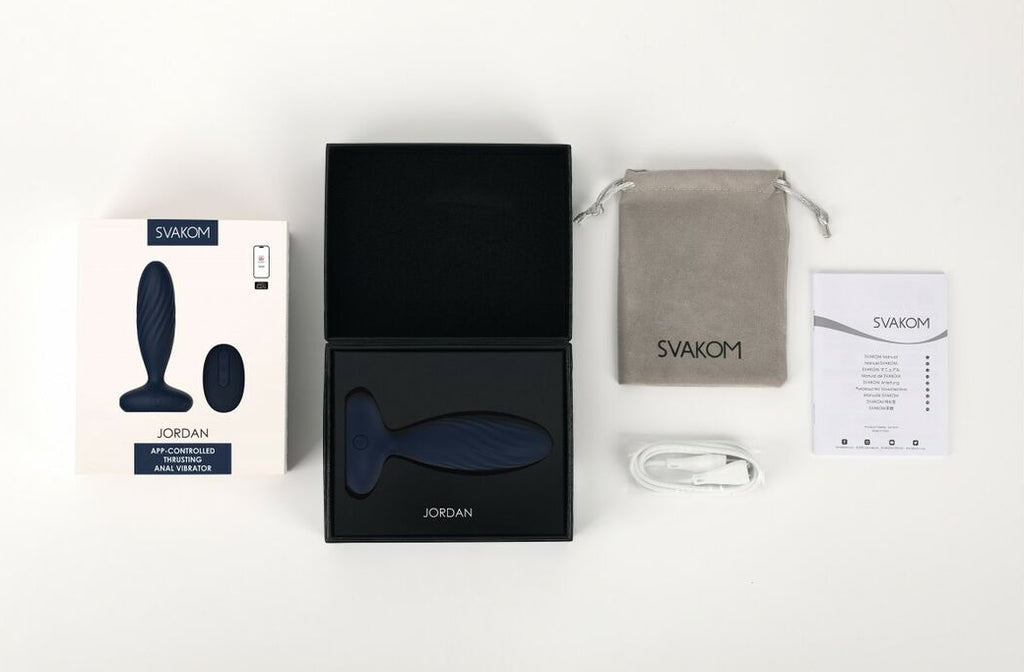 Sexual product set with packaging and accessories on a white background