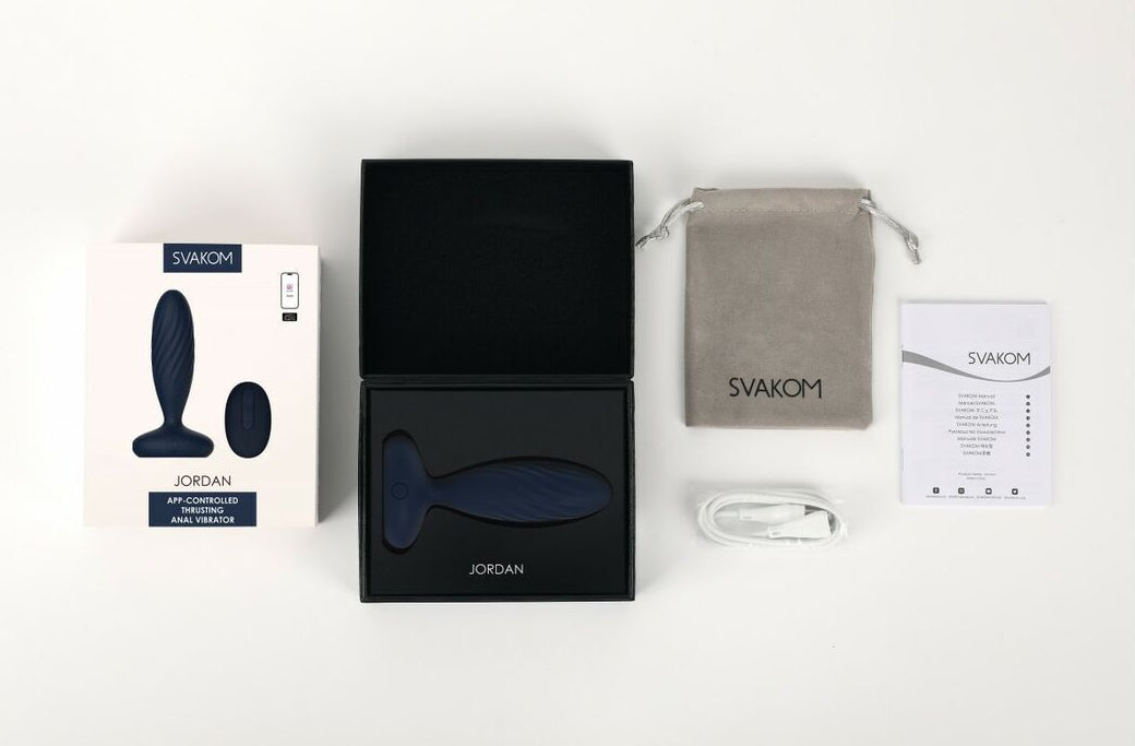 Sexual product set with packaging and accessories on a white background