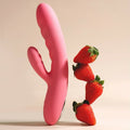 Pink curved adult pleasure toy with strawberries on a beige background
