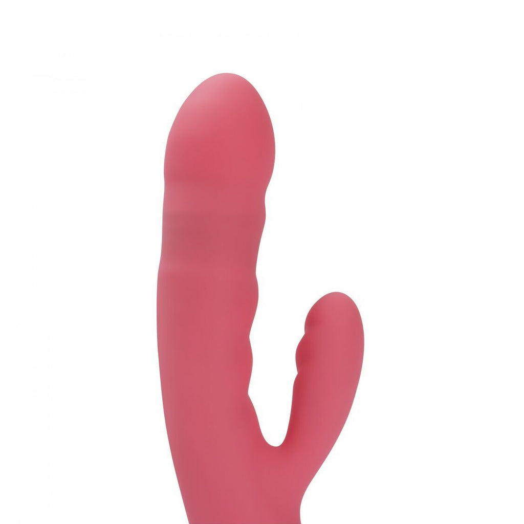 Red silicone rabbit massage wand on a white background
