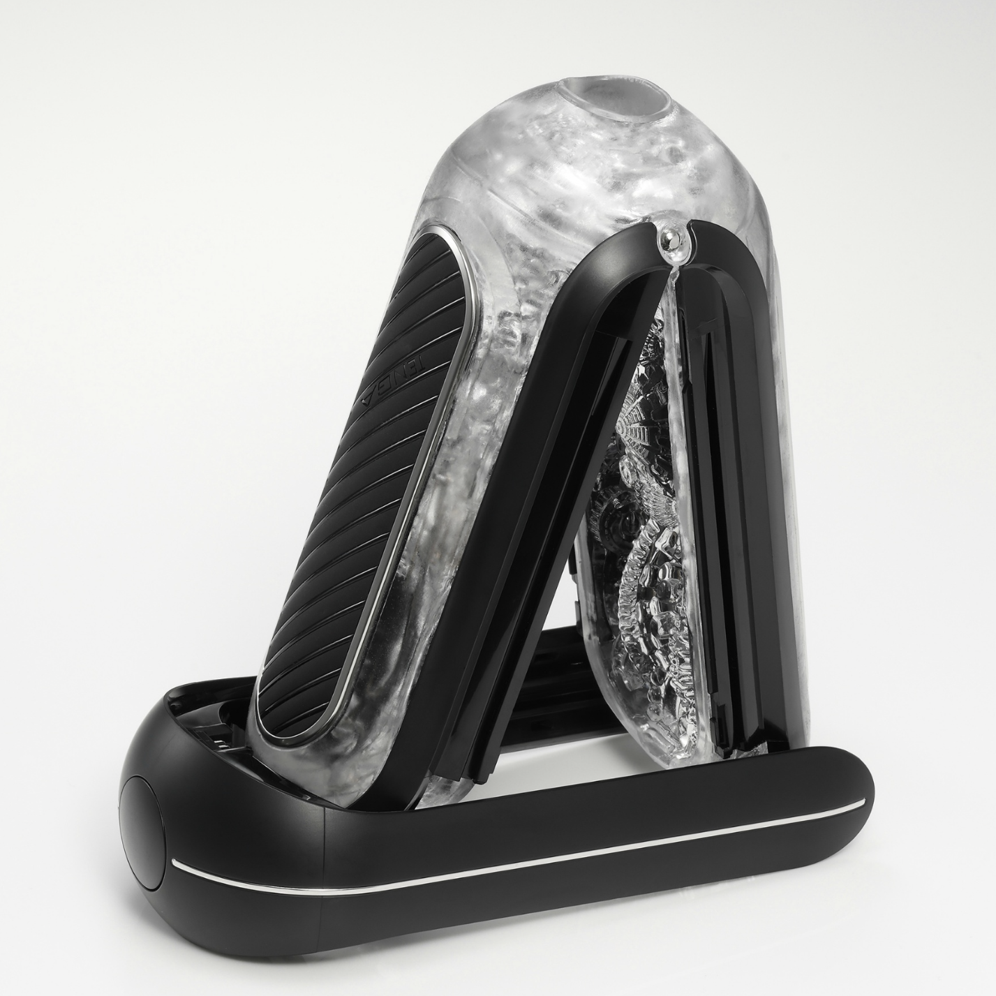 Black and clear automatic masturbator device on a white background