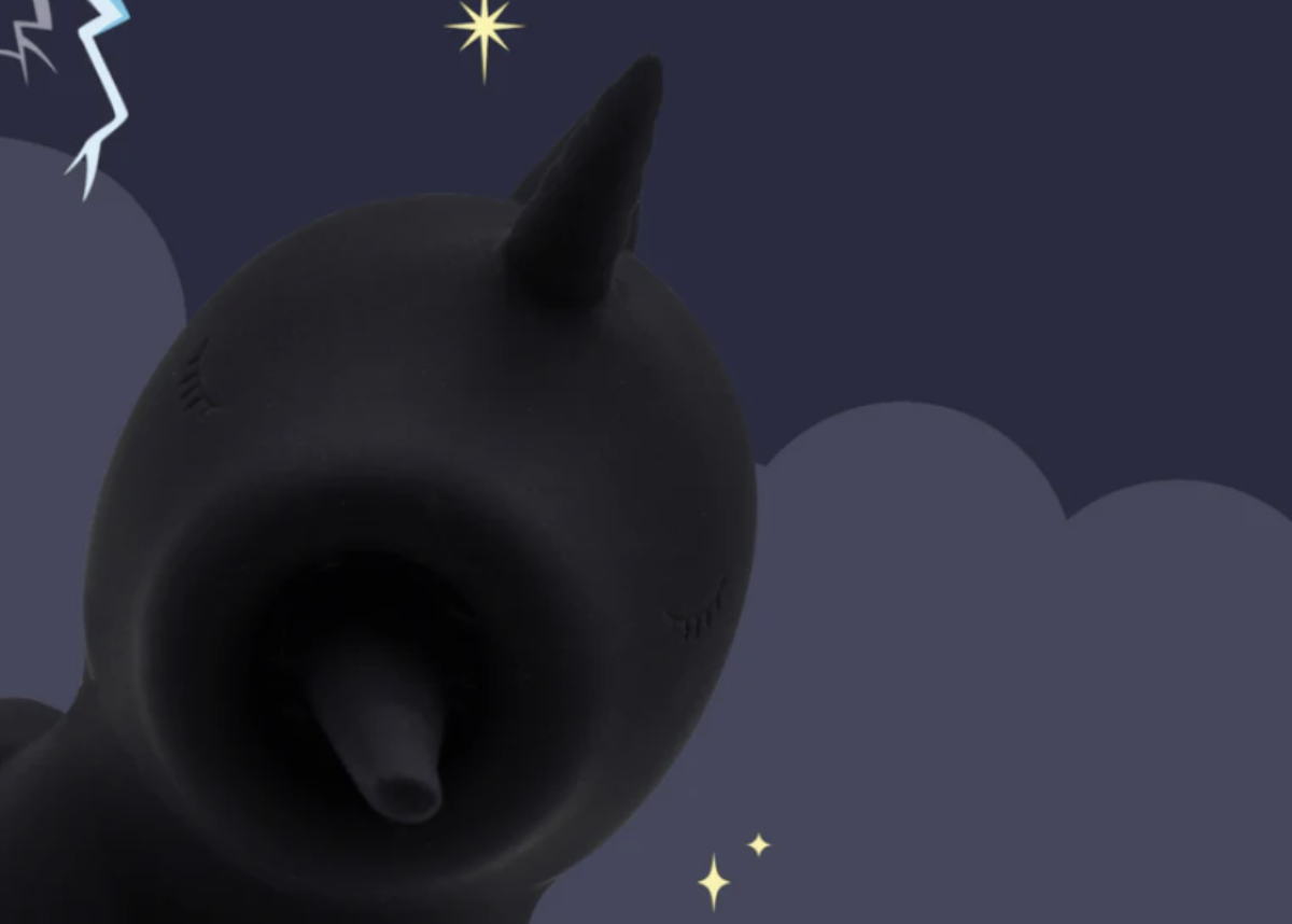 Black cat silhouette against a night sky with stars and lightning.