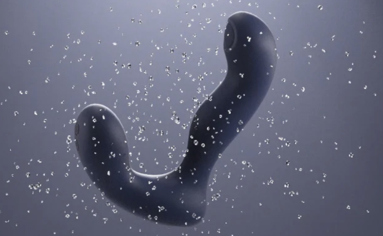 Silhouette of a prostate massager snowflakes falling around, creating a serene winter scene.