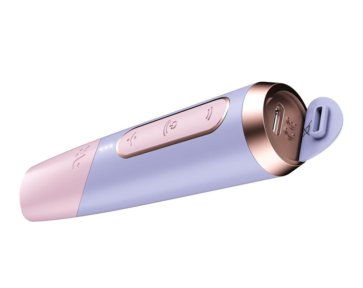 Pink and purple rechargeable  personal massage device on a white background