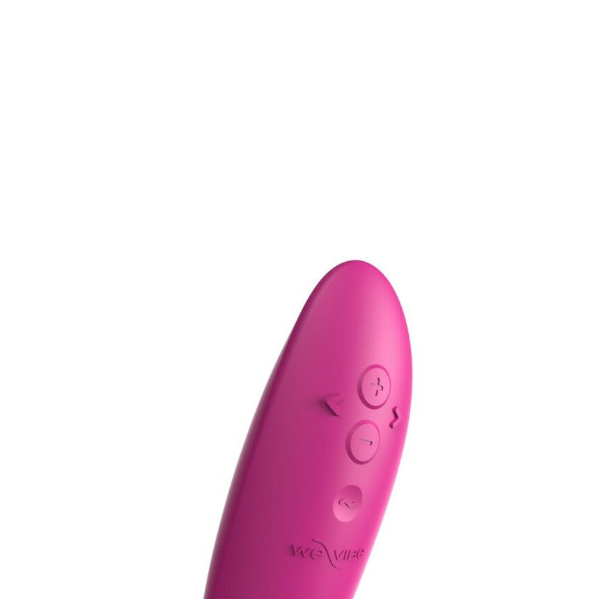 Pink electronic device with buttons and 'we-vibe' branding on a white background