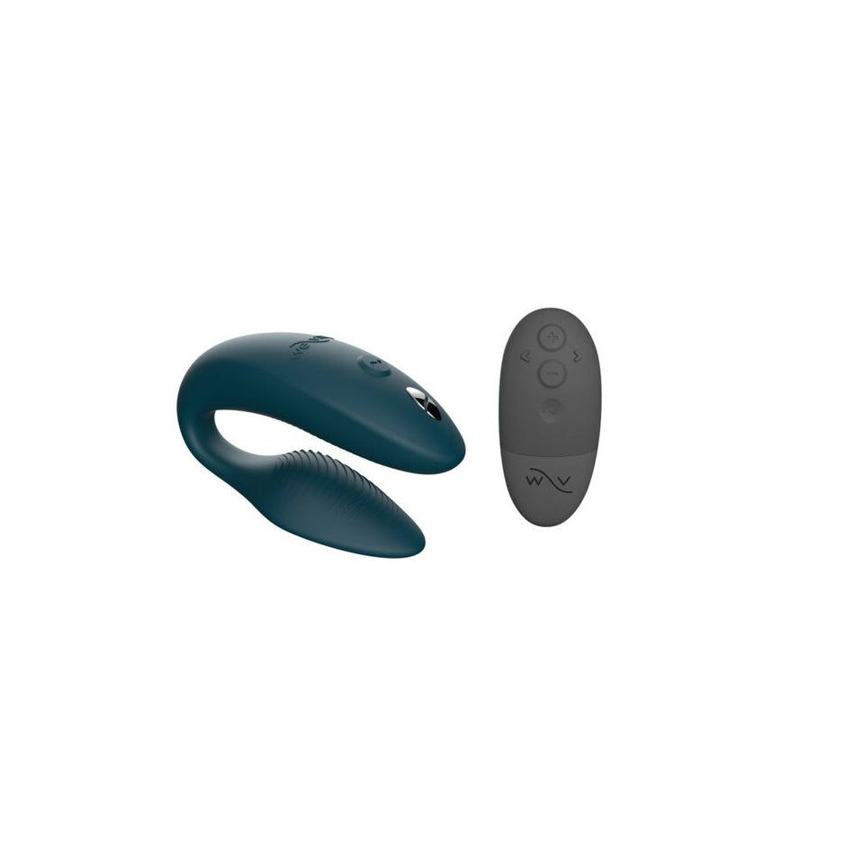 dark grey intimate massager with remote control over a white background