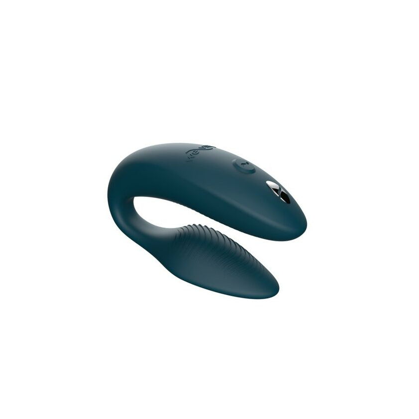 teal u shaped intimate massager on a white background