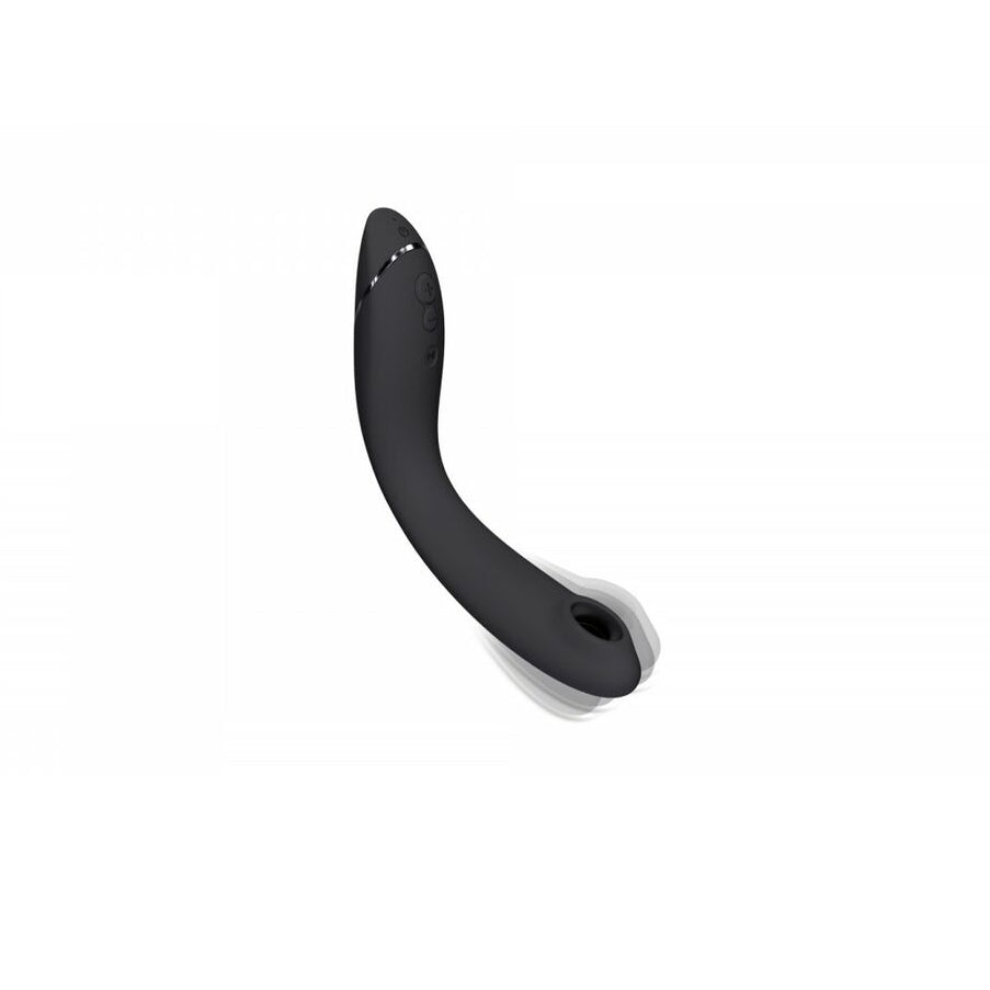 Black curved erotic product toy on a white background